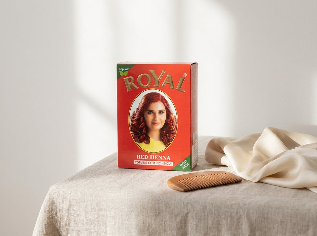 Chevelure volumineuse aux éclats cuivrés et rouges après un rituel de coloration botanique pure Orianza.