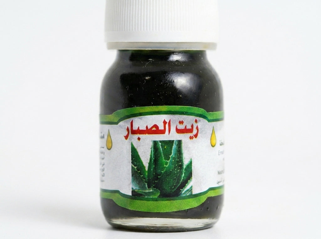 Flacon d'Huile d'Aloe Vera Orianza Selection, soin végétal régénérant pour éclat du visage et nutrition cheveux.