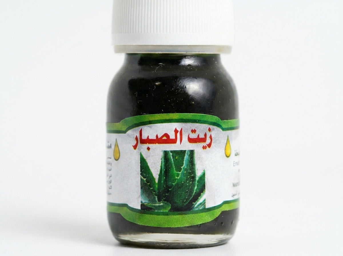 Flacon d'Huile d'Aloe Vera Orianza Selection, soin végétal régénérant pour éclat du visage et nutrition cheveux.