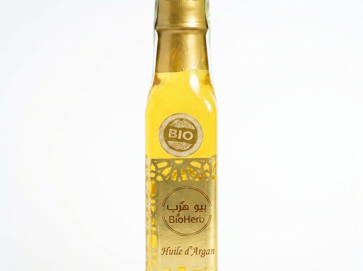 Application généreuse de l'huile d'argan pure 250ml sur le corps après la douche pour hydrater la peau.