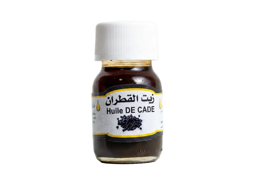 Flacon d'Huile de Cade Juniperus Orianza Selection, un traitement végétal assainissant et anti-pelliculaire puissant.
