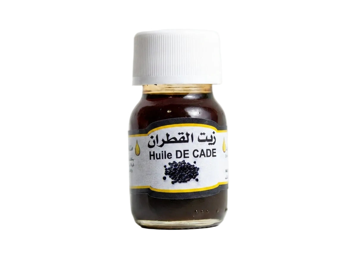 Flacon d'Huile de Cade Juniperus Orianza Selection, un traitement végétal assainissant et anti-pelliculaire puissant.
