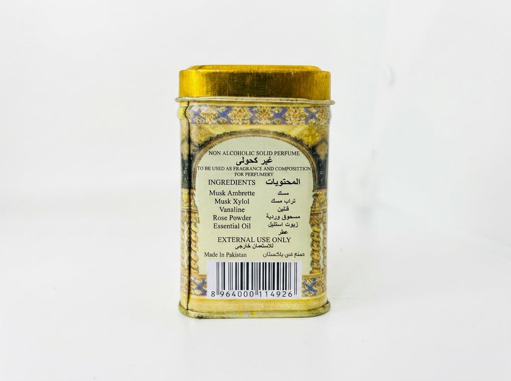 Carré de parfum solide à l'ambre et au musc déposé entre des draps en lin pour parfumer le linge.
