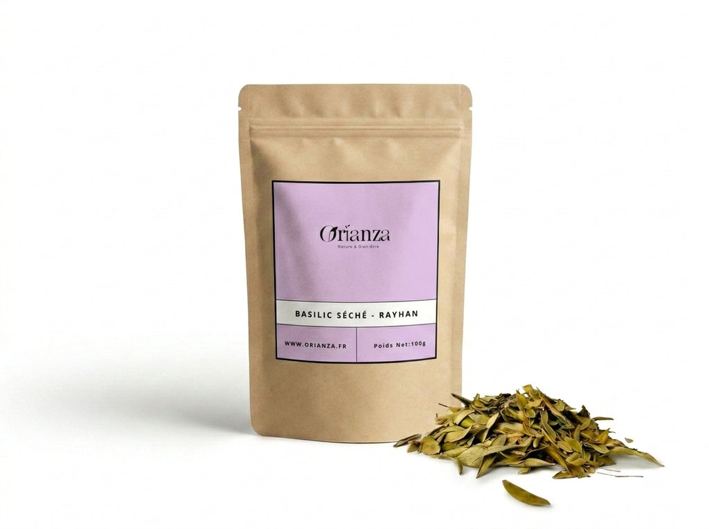 Sachet d'apothicaire en kraft de Basilic Séché Orianza Selection, Rayhan pur pour soin capillaire avec quelques feuilles à côté.