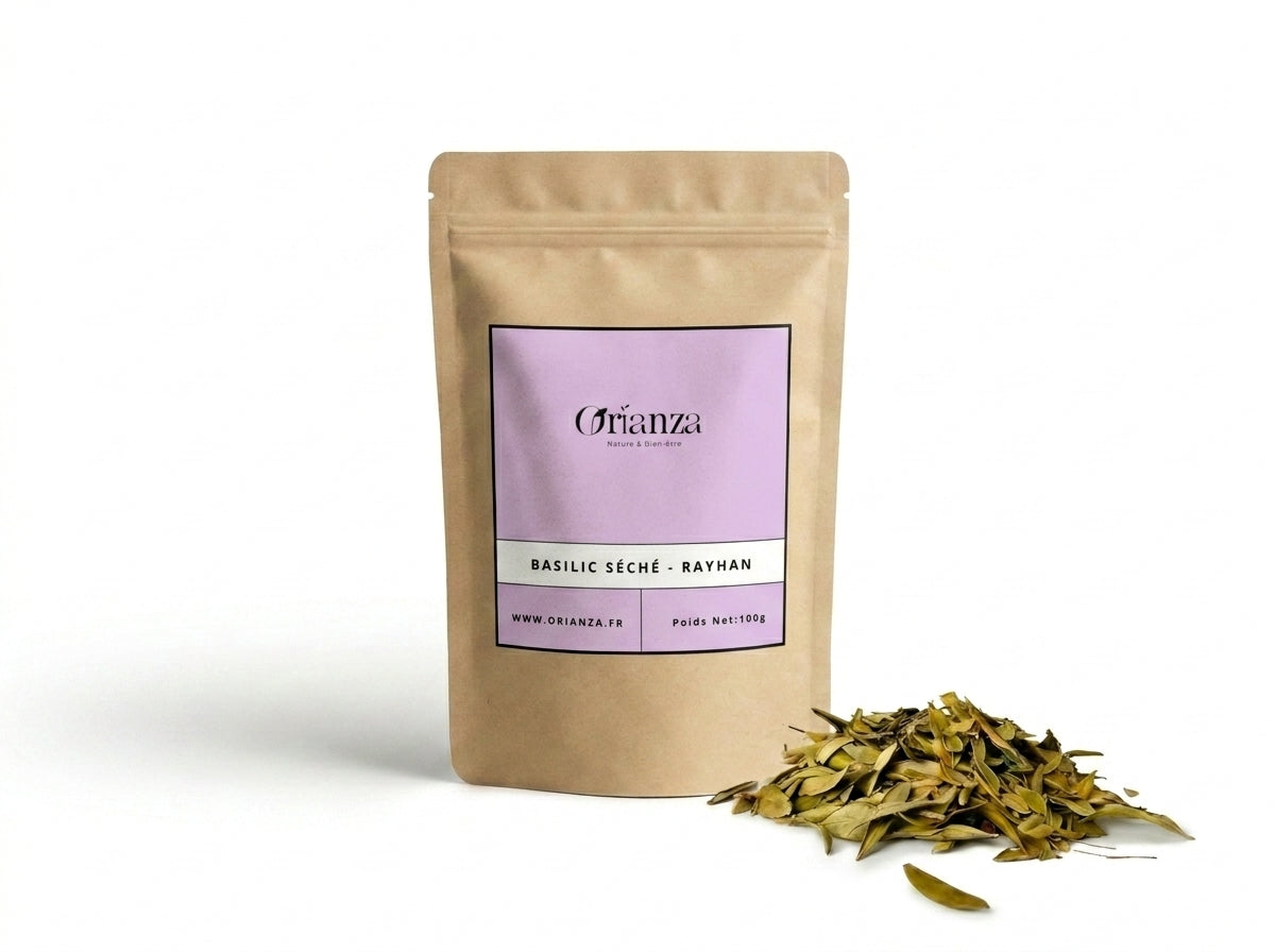 Sachet d'apothicaire en kraft de Basilic Séché Orianza Selection, Rayhan pur pour soin capillaire avec quelques feuilles à côté.
