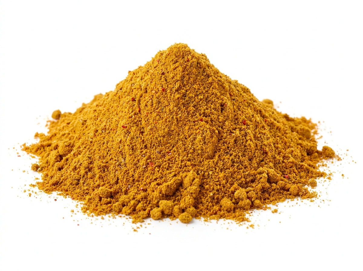 Gros plan sur les composants du mélange avec racines de curcuma, graines de cumin et coriandre entière.