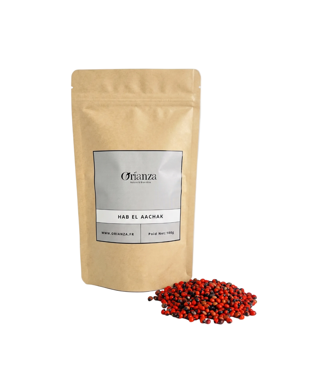 Sachet d'apothicaire en kraft de Hab El Aachak Orianza Selection, graines d'abrus rouges et noires avec quelques graines à côté.
