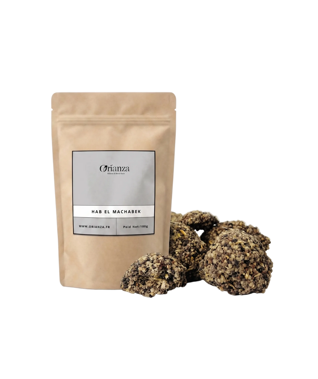 Sachet d'apothicaire en kraft de Hab El Machabek Orianza Selection, encens traditionnel en graines avec quelques morceaux à côté.