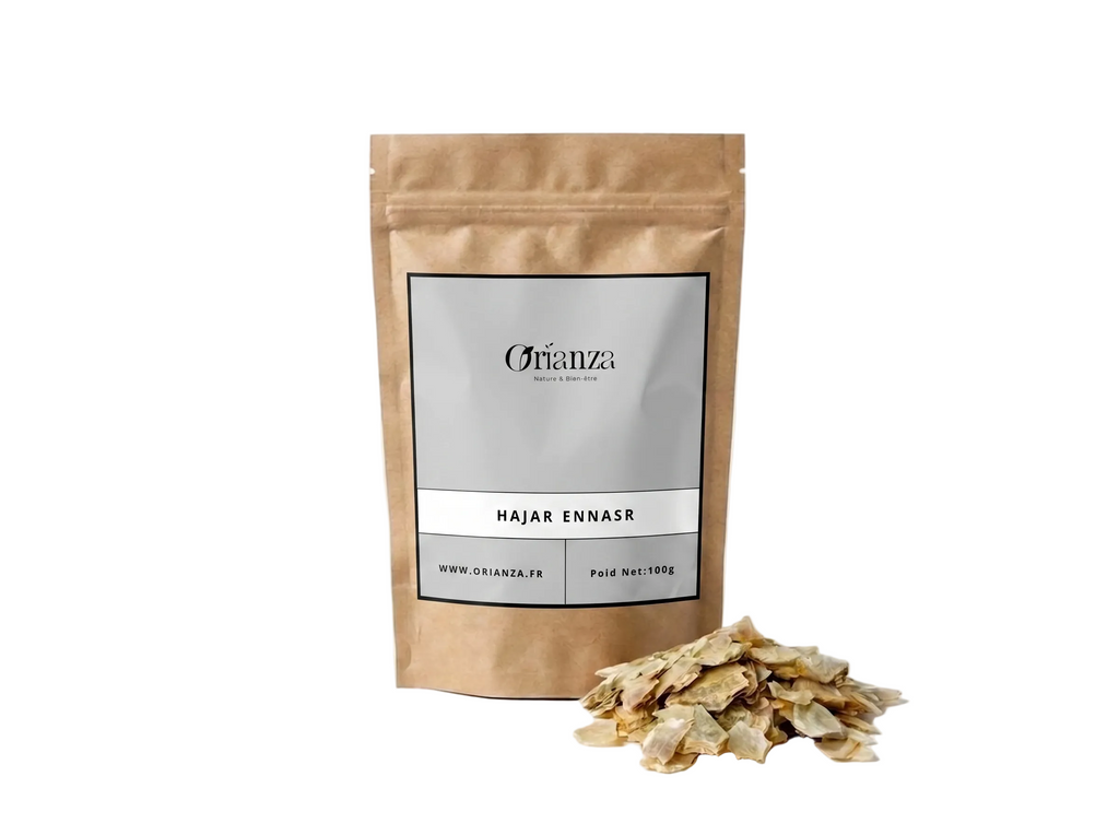 Sachet d'apothicaire en kraft de Hajar Ennasr Orianza Selection, pierre minérale brute pour encens avec quelques morceaux à côté.