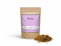 Sachet d'apothicaire en kraft de Halhal Orianza Selection, lavande papillon pure pour infusion avec quelques fleurs séchées à côté.